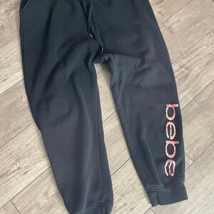Bebe womens Black Sweatpants with Pink Logo